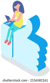 Young woman uses tablet or smartphone for chatting and surfing Internet. Girl sitting on like icon with phone in hands. Social networks, user profile in media. Lady using modern gadget, technology