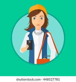 Young woman using a smartphone. Professional business woman with suitcase working with smartphone. Woman messaging on smartphone. Vector flat design illustration in the circle isolated on background.