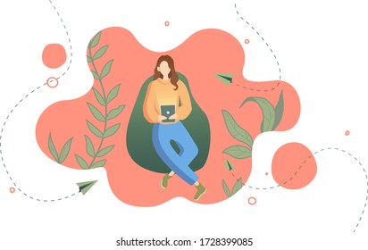 Young woman using a tablet working. Girl on a background of pink green plants.