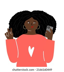 Young woman with victory sign hand in funny happy mood, making selfie. Portrait of cute african woman with long curly hair isolated on the white background.