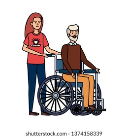 young woman volunteer with old man in wheelchair
