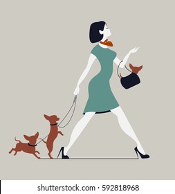 Young woman walking dogs. Fashionista with dogs