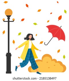 Young woman is walking under an umbrella in rain. Girl is wearing coat. Lifestyle in autumn concept, rainy weather. Character in modern flat design, running child strolling in park under leaf fall