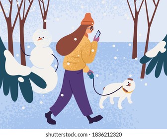 Young Woman In Warm Outerwear Walking Dog In Park And Looking In Smartphone. Female Character With Pet In Winter Forest. Person Walk In Snowy Weather. Vector Flat Cartoon Illustration.