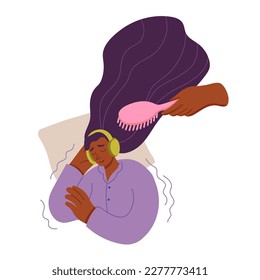 Young woman wearing headphones with closed eyes listens brushing hair sound. Concept of using ASMR content to relax for a restful sleep.