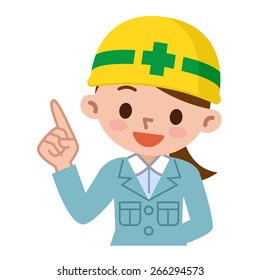Young woman wearing a helmet is pointing