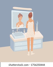 Young woman wearing pajama putting night cream on her skin. Cartoon girl looking at her reflection in mirror in bathroom. Everyday evening routine. Skincare and beauty. Flat vector illustration