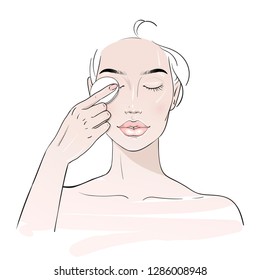 Young woman who cleans her face with cotton pads. Girl remove eye make up. Skin care routine. Fashion woman sketch. Spa beauty concept. Hand drawn vector illustration. 