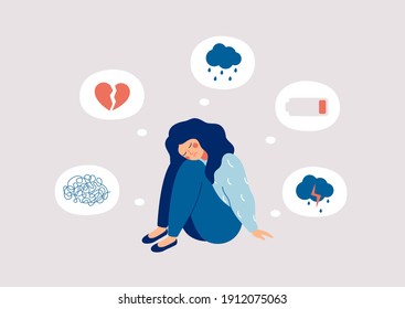 Young woman who suffers from mental health diseases is sitting on the floor. Girl surrounded by symptoms of depression disorder: anxiety, crisis, tears, exhaustion, loss,  overworked, tired.