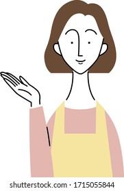 young woman who is wearing an apron / guidance gesture