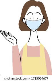 young woman who is wearing a surgical mask and an apron / guidance gesture
