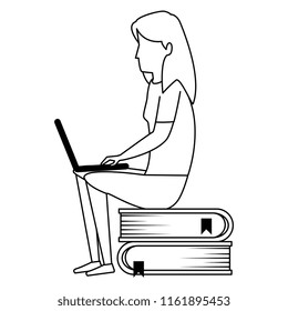 young woman working with laptop in books