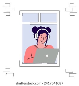A young woman working on her laptop by the window. Freelancer, remote worker, student with a computer.