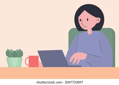 A young woman is working on a laptop from home. Remote work. A cozy workplace. Comfortable working conditions. Video communication via webcam. Education from home via the Internet and online courses