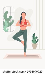 Young Women Doing Yoga in Home  Tree Pose