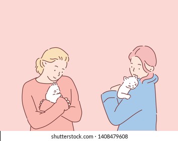 Young women holds in her arms and hugs cat. Hand drawn style vector design illustrations.