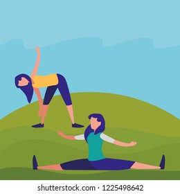 young women practicing exercice on the park