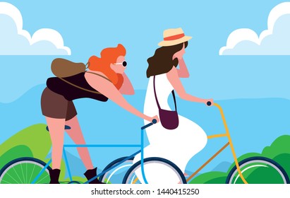 young women riding bike with landscape