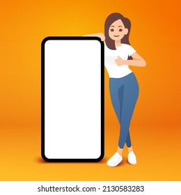 Young Women Stand Beside A Blank Mock Up Smartphone