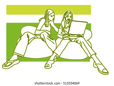 young women talking, looking to a labtop 