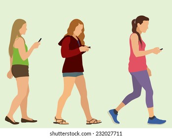 Young Women or Teenage Girls Walking and Texting