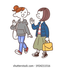 Mujeres jóvenes caminando mientras hablan