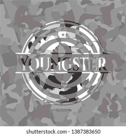 Youngster on grey camo texture
