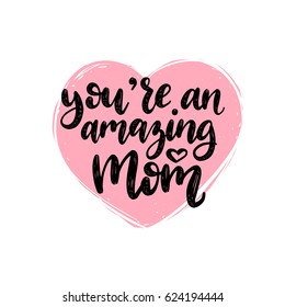 You're An Amazing Mom vector calligraphic inscription. Happy Mother's Day hand lettering illustration in heart shape for greeting card, festive poster etc.