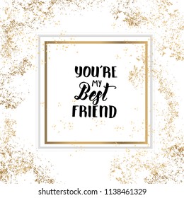 You're my Best Friend - Friendship Day lettering calligraphy phrase on golden and white background with golden tinsel. Hand drawn quote