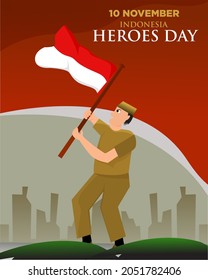 Youths flying the Indonesian flag on Heroes Day