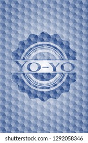 Yo-yo blue badge with geometric background.