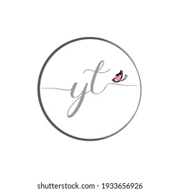 YT initial letter handwriting logo design with butterfly