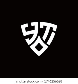 YT monogram logo with modern shield style design template isolated on black background