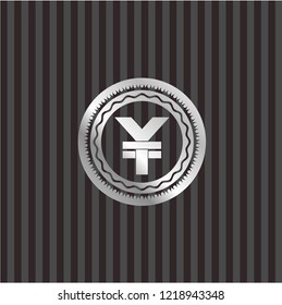 yuan icon inside silver emblem or badge