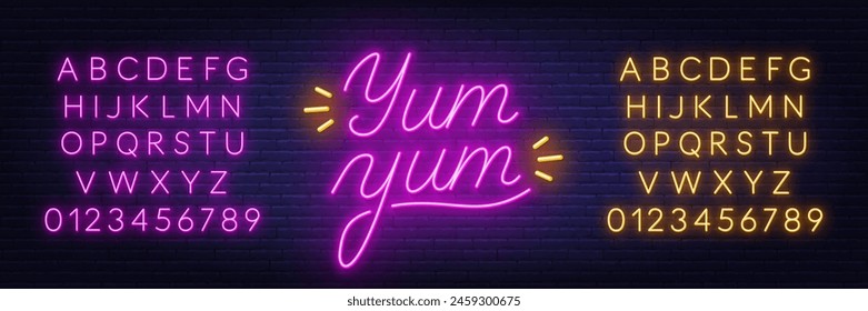 Yum Neon Sign on brick wall background.