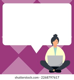 Yung girl sitting on the floor with laptop. Typing message. Important information written over white board under woman head. Big place for text behind model.