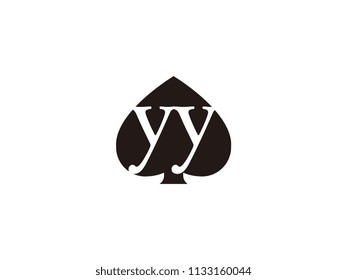 The yy initials logo inside the black shovel