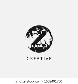 Z Circle  Brush Stroke Letter Logo design. Monogram Black Paint Logo Letter Icon with Elegant circle brush shape Vector Design concept.