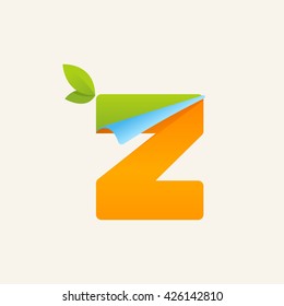 Z paper letter logo with green leaves icon and folded corner. Vector paper style typeface. Ecology letter for card, app icon, corporate identity, label or poster.