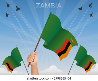 Zambia flags fluttering under the blue sky