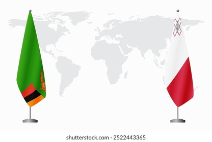 Banderas de Zambia y Malta para reunión oficial con el mapa del mundo como fondo.