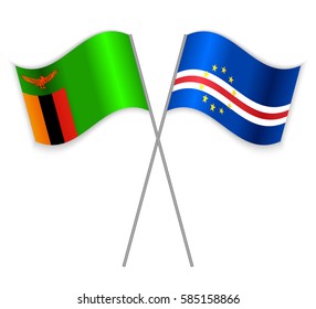 Zambian and Cabo Verdean crossed flags. Zambia combined with Cape Verde isolated on white. Language learning, international business or travel concept.