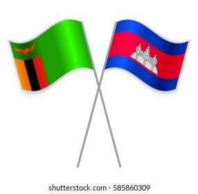 Zambian and Cambodian crossed flags. Zambia combined with Cambodia isolated on white. Language learning, international business or travel concept.