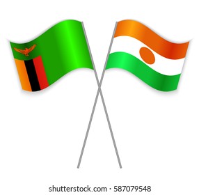 Zambian and Nigerien crossed flags. Zambia combined with Niger isolated on white. Language learning, international business or travel concept.