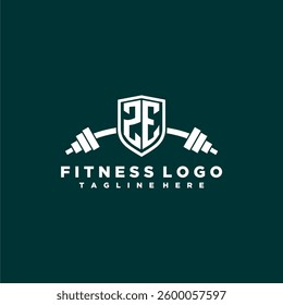 ZE initial monogram for fitnes or gym logo with creative shield and barbell design