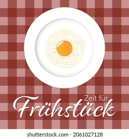 Zeit für Frühstück - German Text - Translation: time for breakfast - sunny side up egg on a plate.