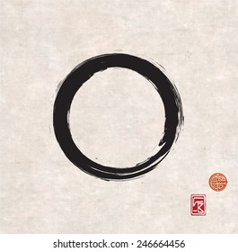 Zen circle on vintage rice paper with decorative stamps. Black circle hand-drawn with ink.