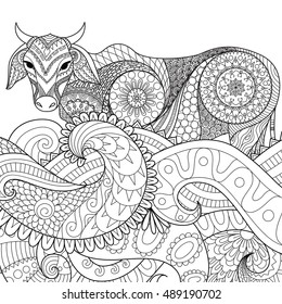 Zendoodle design of cow swimming in the ocean for adult coloring book pages