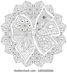 Zentangle stylized bow-knot on a patterned round substrate