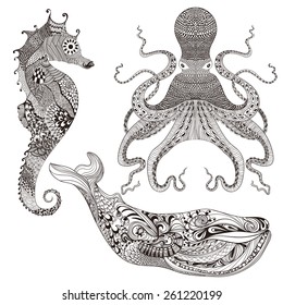 Zentangle stylized Octopus, Whale and Sea Horse. Hand Drawn doodle vector illustration isolated on white background. Sketch for tattoo or makhenda. Sea collection.